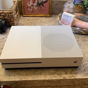 A used Xbox one s need more information text 571-478-7615